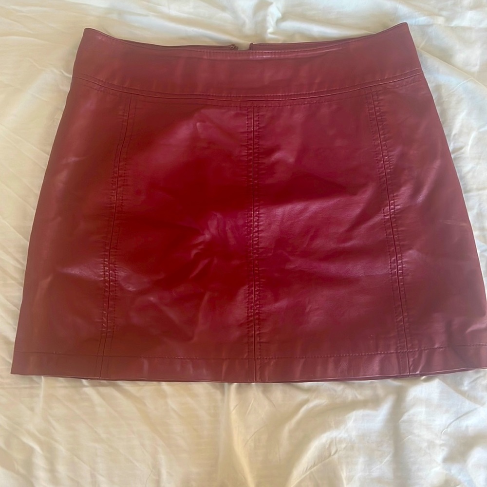 Faux leather maroon skirt. Size 6.